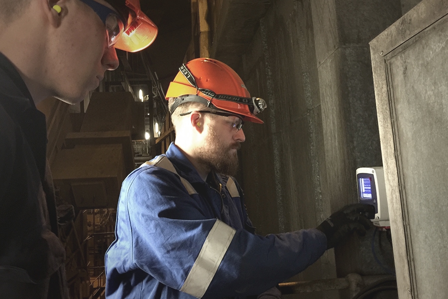 Man doing laser installation