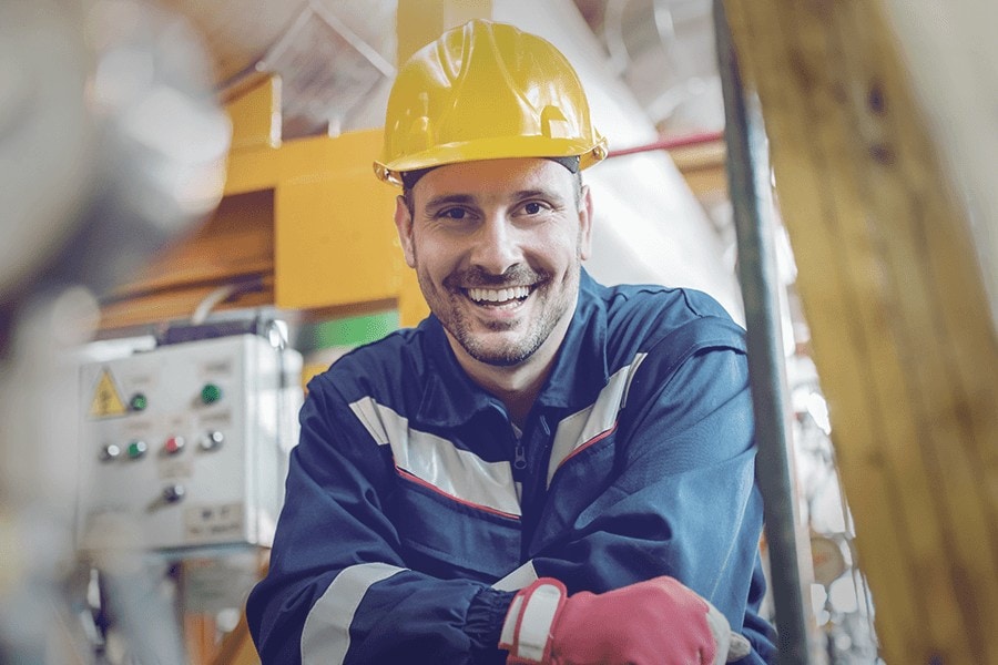 Man smiling in a hardhat