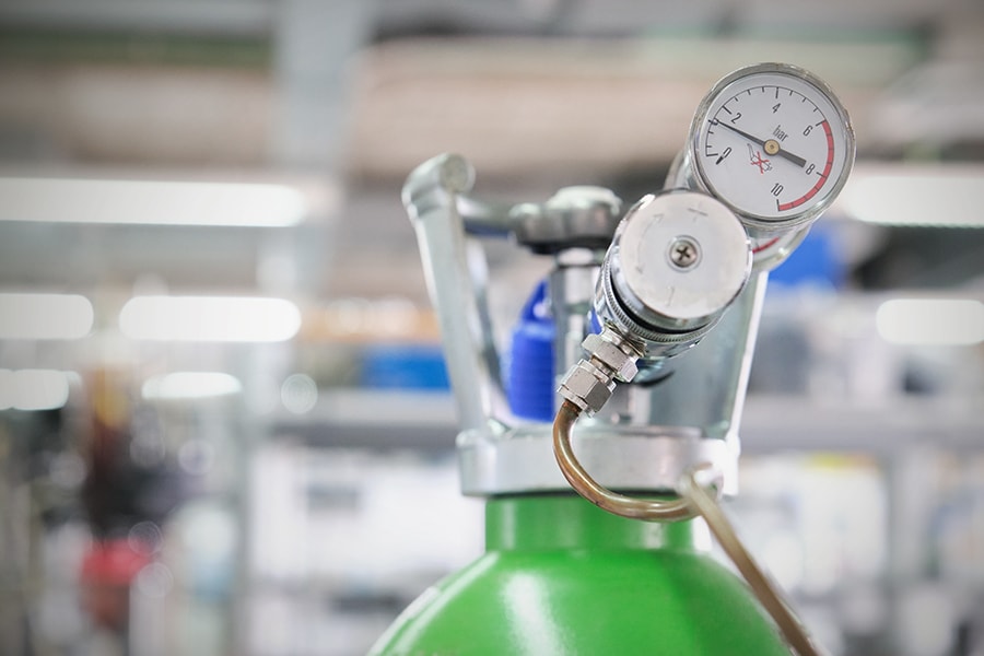 Gas Cylinders With Pressure Gauge In A Specialized Laboratory Laboratory