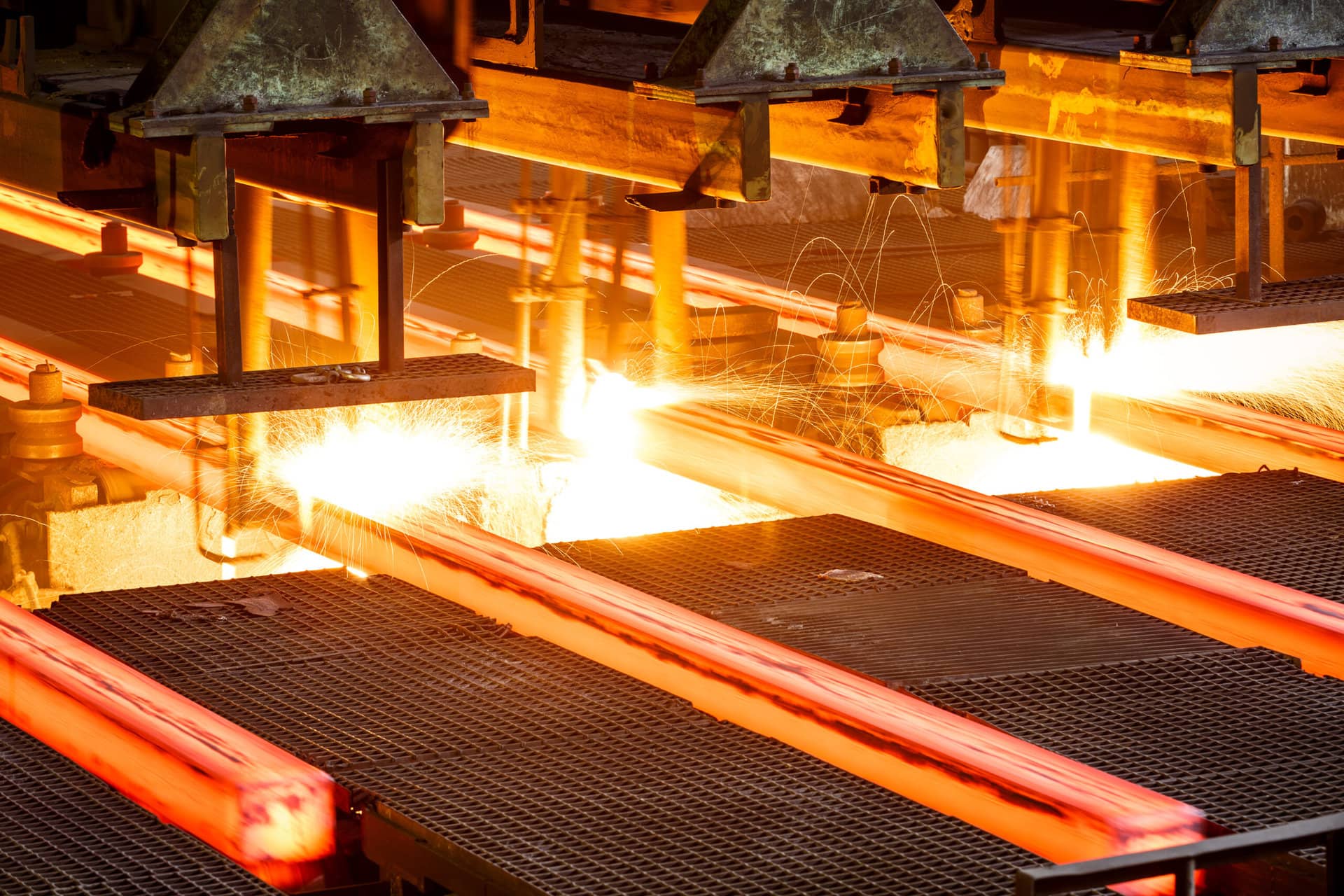 image of hot steel on conveyor Close shot in steel mill