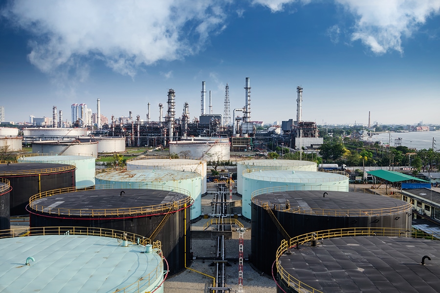 Landscape of oil refinery industry with oil storage tank